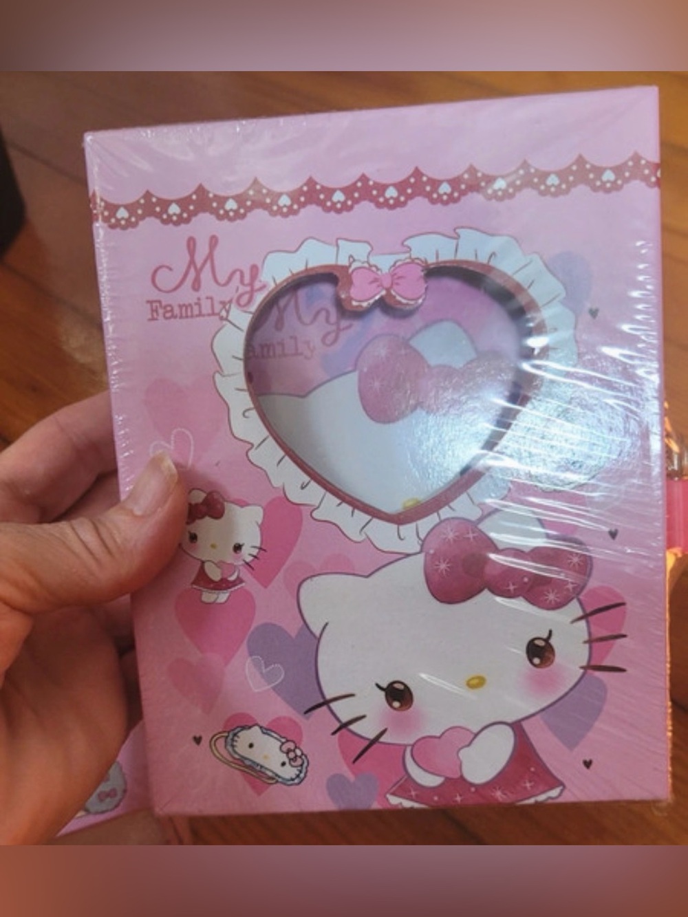 Hello Kitty pink diary with heart-shaped window and bow